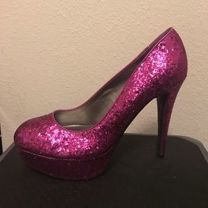 Pink sparkly and glitter platform heels.